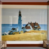 A12. Framed print of Edward Hopper's “Portland Head.” Frame: 27”h x 35”w 